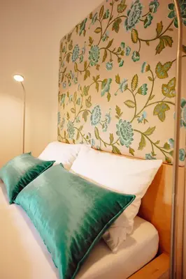 Ein Bett oder Betten in einem Zimmer der Unterkunft it‘s me