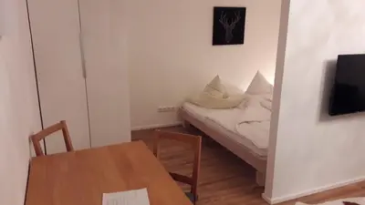Ein Bett oder Betten in einem Zimmer der Unterkunft FeWo am Wurmberg Braunlage I Verwaltung und Betreuung durch FIRMA ZZ-Braunlage