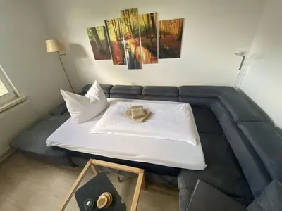 Ein Bett oder Betten in einem Zimmer der Unterkunft Holiday apartment on the Anger