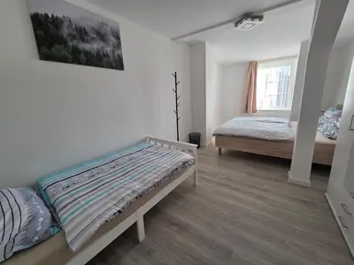 Ein Bett oder Betten in einem Zimmer der Unterkunft FeWo 101