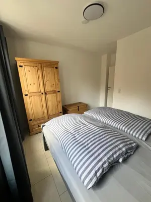 Ein Bett oder Betten in einem Zimmer der Unterkunft Große Wanderunterkunft am Hexentanzplatz U