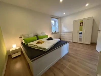 Ein Bett oder Betten in einem Zimmer der Unterkunft Ferienwohnung Knopp