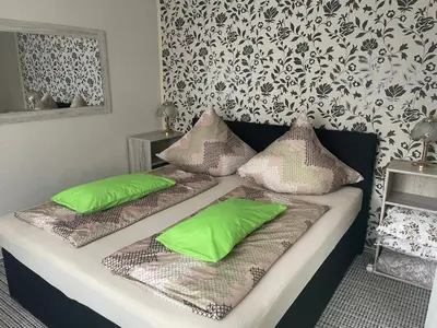 Ein Bett oder Betten in einem Zimmer der Unterkunft Ferienhaus Belkot