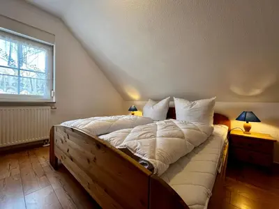 Ein Bett oder Betten in einem Zimmer der Unterkunft JS Feriendomizile: Fewo Hirschwechsel