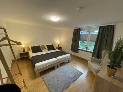 Ein Bett oder Betten in einem Zimmer der Unterkunft Gemütliche Terassenwohnung mit rustikalem Charme