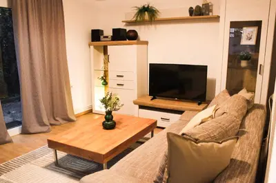 Ein Sitzbereich in der Unterkunft Gemütliche Terassenwohnung mit rustikalem Charme