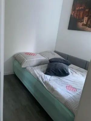 Ein Bett oder Betten in einem Zimmer der Unterkunft Ferienwohnung Hahnenklee