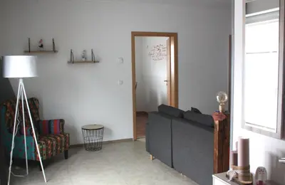 Ein Sitzbereich in der Unterkunft Ferienwohnung Gundermann