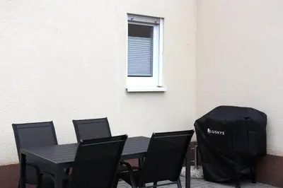 Ein Sitzbereich in der Unterkunft Ferienwohnung Gundermann