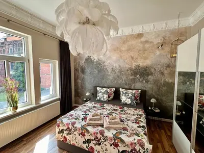 Ein Bett oder Betten in einem Zimmer der Unterkunft Villa Bellevue