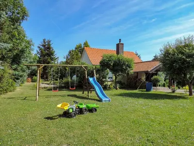 Ein Kinderspielbereich in der Unterkunft Ferienhaus Baldamus in Blankenburg