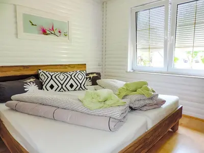 Ein Bett oder Betten in einem Zimmer der Unterkunft Ferienhaus Baldamus in Blankenburg