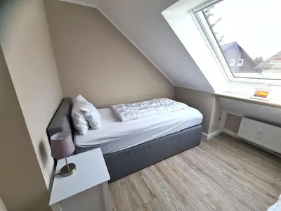 Ein Bett oder Betten in einem Zimmer der Unterkunft Bergliebe