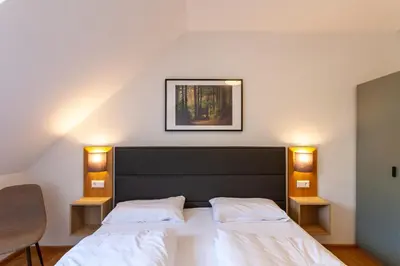 Ein Bett oder Betten in einem Zimmer der Unterkunft Fewo WurmbergLaune - nur 350 m zur Wurmbergseilbahn