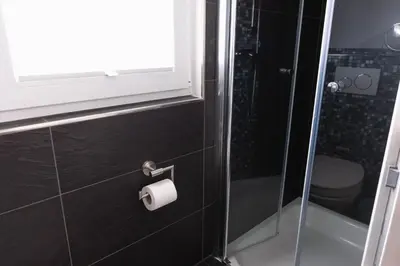 Ein Badezimmer in der Unterkunft Ilsehof Tiny-House Mimi