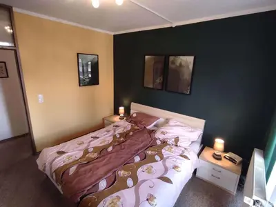 Ein Bett oder Betten in einem Zimmer der Unterkunft Ferienwohnung Harzverliebt