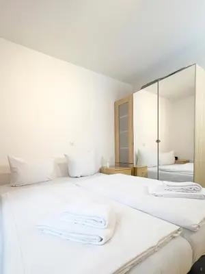 Ein Bett oder Betten in einem Zimmer der Unterkunft Ferienwohnung Harzer Kleinod