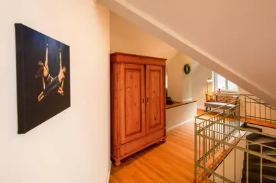 Ein Bett oder Betten in einem Zimmer der Unterkunft Plumbohms Haus Looges