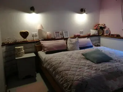 Ein Bett oder Betten in einem Zimmer der Unterkunft Ferienhaus Rosaly