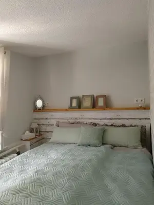 Ein Bett oder Betten in einem Zimmer der Unterkunft Ferienhaus Rosaly
