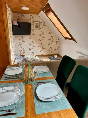 Ein Sitzbereich in der Unterkunft Apartment Waldkauz - Altenau