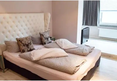 Ein Bett oder Betten in einem Zimmer der Unterkunft VALHALLA'S Hütte