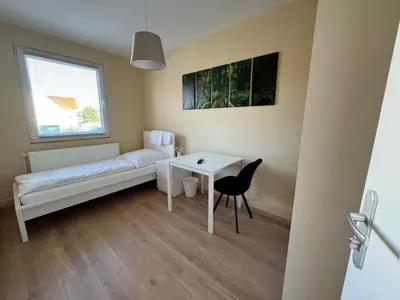 Ein Bett oder Betten in einem Zimmer der Unterkunft Kurzzeitunterkunft Goslar