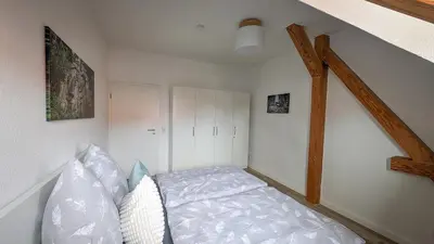 Ein Bett oder Betten in einem Zimmer der Unterkunft Albertine 2
