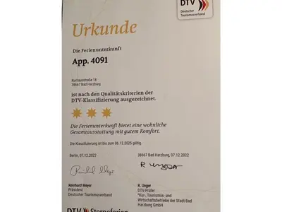 Ein Zertifikat, Auszeichnung, Logo oder anderes Dokument, das in der Unterkunft Ferienwohnung Mester mit Schwimmbad Sauna ausgestellt ist