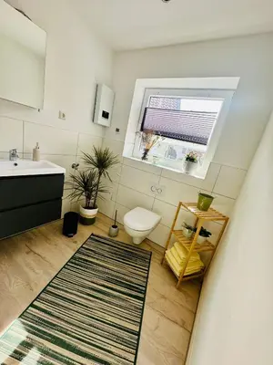 Ein Badezimmer in der Unterkunft Lous Ferienwohnung