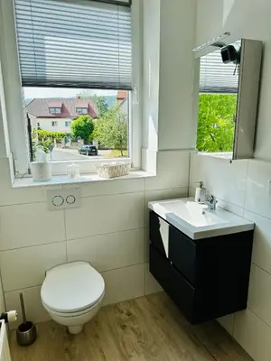 Ein Badezimmer in der Unterkunft Lous Ferienhaus 1