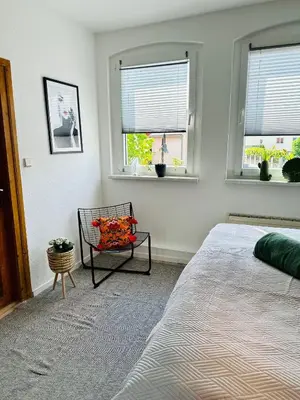 Ein Bett oder Betten in einem Zimmer der Unterkunft Lous Ferienhaus 1