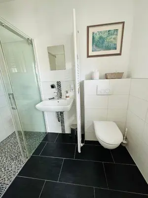 Ein Badezimmer in der Unterkunft Lous Ferienhaus 3
