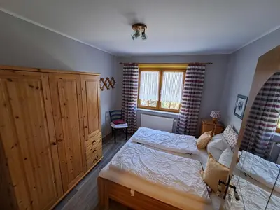 Ein Bett oder Betten in einem Zimmer der Unterkunft Oleander