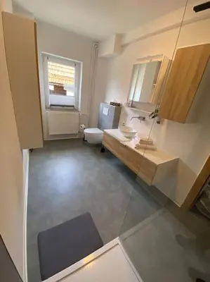 Ein Bett oder Betten in einem Zimmer der Unterkunft Haus PANORAMA - Appartement Auszeit 2