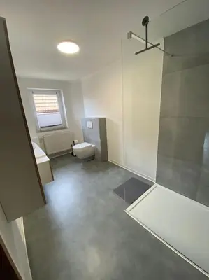Ein Badezimmer in der Unterkunft Haus PANORAMA - Appartement Auszeit 1