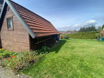 Ein Garten an der Unterkunft Haus PANORAMA - Appartement Auszeit 1