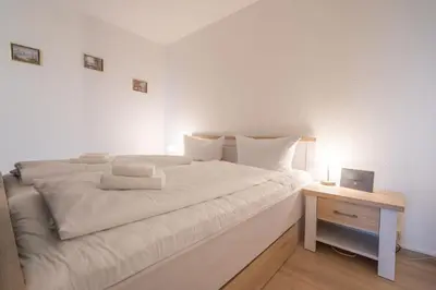 Ein Bett oder Betten in einem Zimmer der Unterkunft Phlox