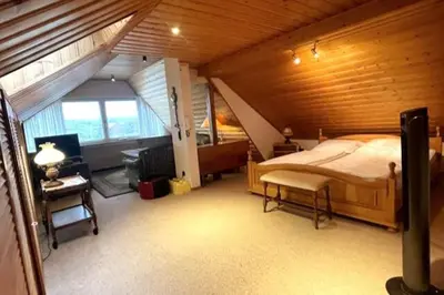 Ein Bett oder Betten in einem Zimmer der Unterkunft Haus PANORAMA - Appartement Auszeit 5