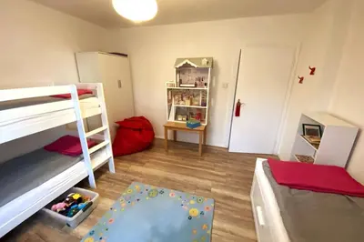 Ein Bett oder Betten in einem Zimmer der Unterkunft Haus PANORAMA - Appartement Auszeit 6