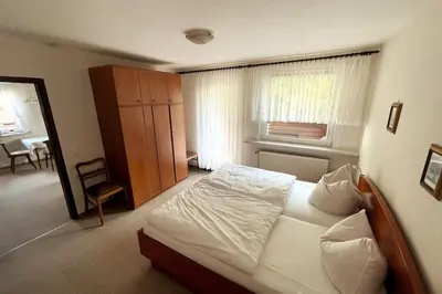 Ein Bett oder Betten in einem Zimmer der Unterkunft Haus PANORAMA - Appartement Auszeit 4