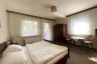 Ein Bett oder Betten in einem Zimmer der Unterkunft Haus PANORAMA - Appartement Auszeit 3