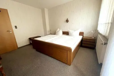 Ein Bett oder Betten in einem Zimmer der Unterkunft Haus PANORAMA - Appartement Auszeit 3