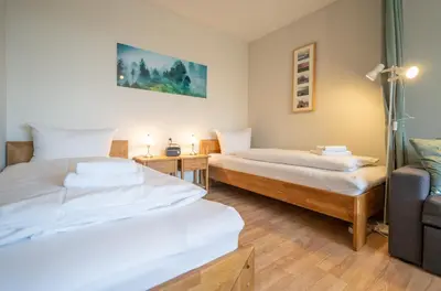 Ein Bett oder Betten in einem Zimmer der Unterkunft Aster