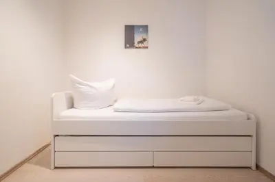 Ein Bett oder Betten in einem Zimmer der Unterkunft Bergblick