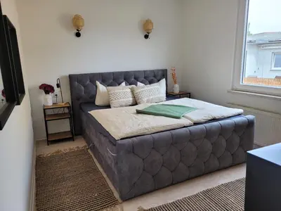 Ein Bett oder Betten in einem Zimmer der Unterkunft Lous Ferienhaus 4