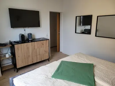 Ein Bett oder Betten in einem Zimmer der Unterkunft Lous Ferienhaus 4