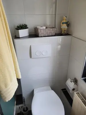 Ein Badezimmer in der Unterkunft Lous Ferienhaus 4