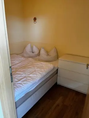 Ein Bett oder Betten in einem Zimmer der Unterkunft Apartment 582