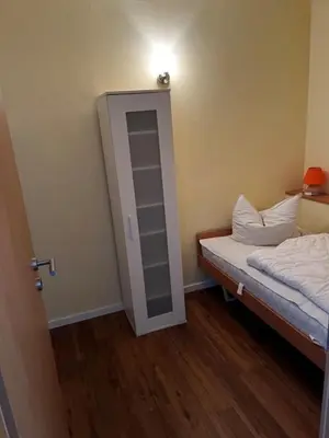 Ein Bett oder Betten in einem Zimmer der Unterkunft Apartment 582